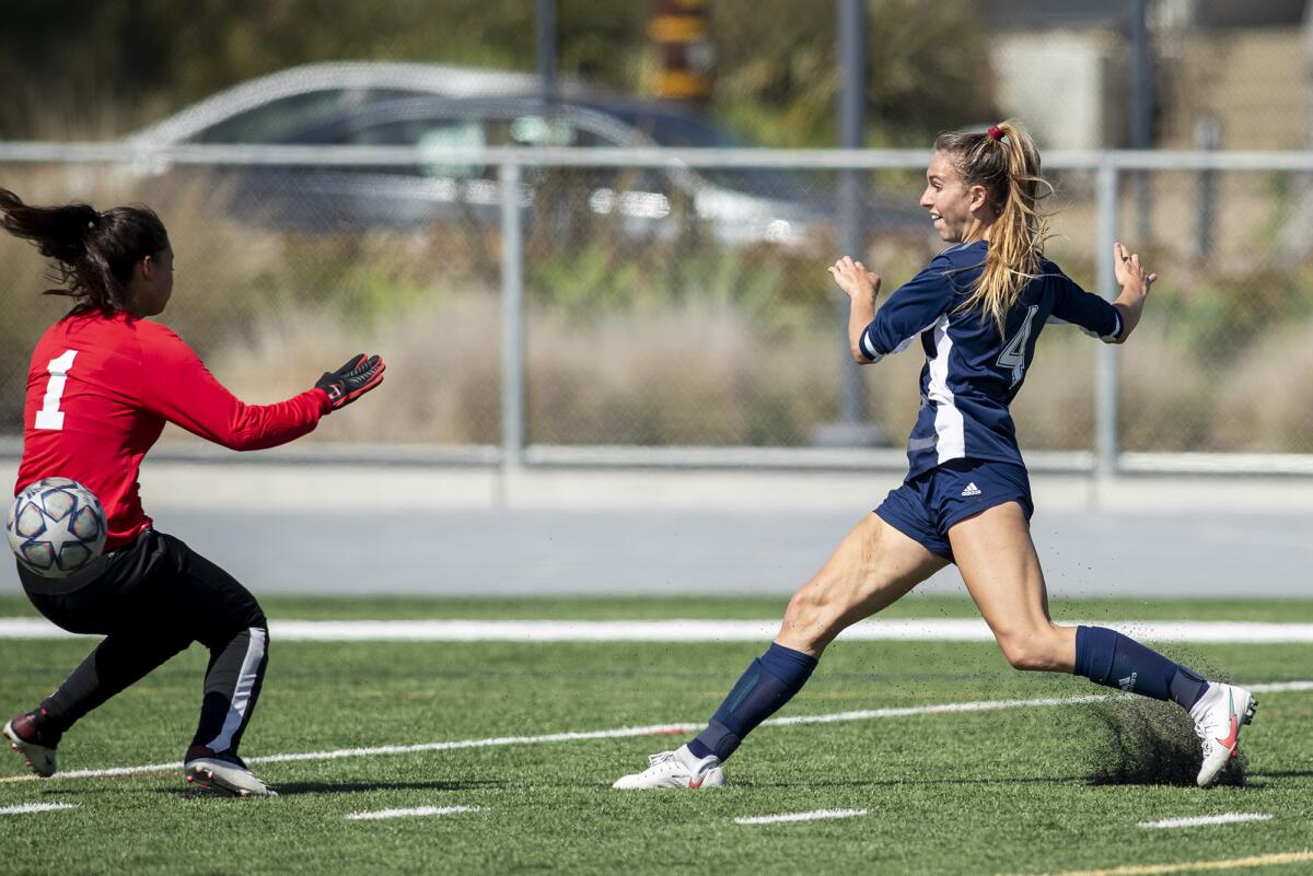 Newport Harbor's Kenna Robar, right, shown shooting against rival CdM on April 6, had a goal in the Sailors' 3-1 win.