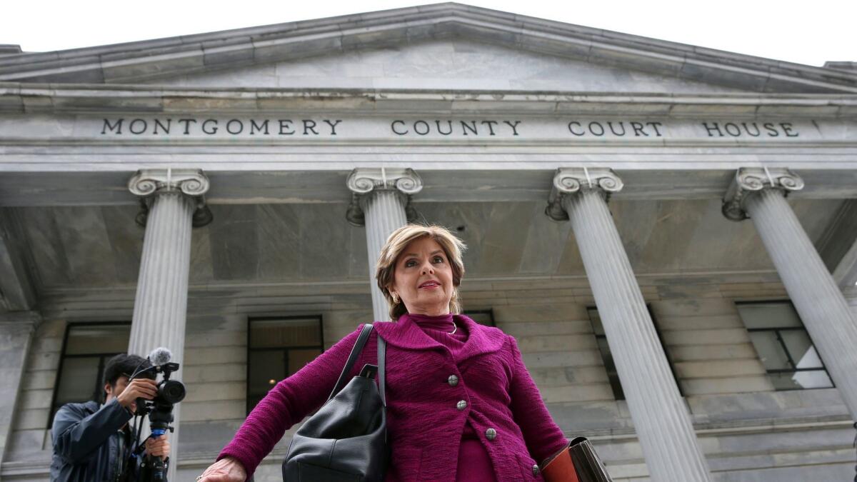 Attorney Gloria Allred walks outside during a break in a hearing in the Bill Cosby sexual assault case in Norristown, Pa., on Tuesday.