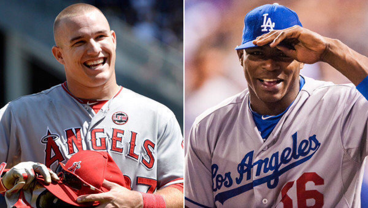 Angels outfielder Mike Trout, left, and Dodgers rookie Yasiel Puig could be the greatest baseball duo to grace a city since Mickey Mantel and Willie Mays established their enduring legacies in New York.