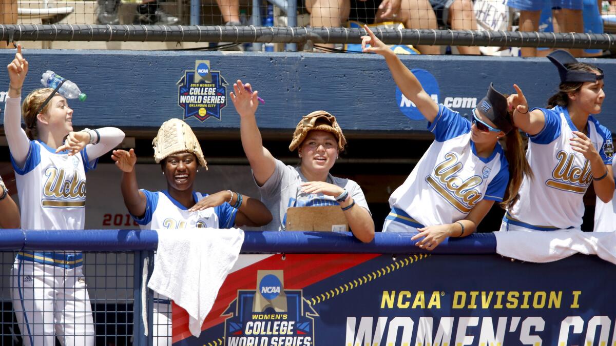 UCLA players wear a variety of rally caps during their game against Florida State on Saturday.