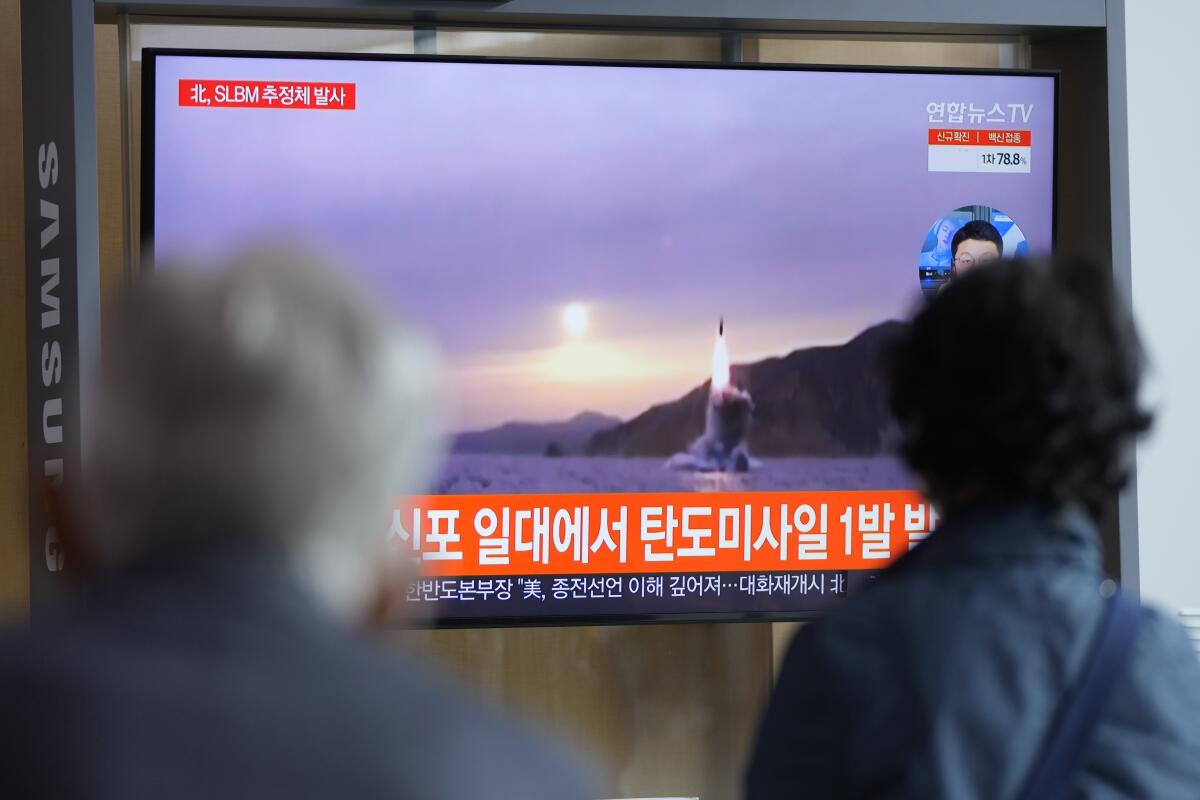 TV screen showing a missile launch