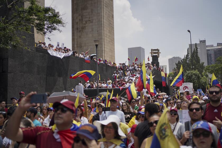 Venezuelan nationals protest against the official results that declared President Nicolas Maduro the winner of the July presidential election, in Mexico City, Saturday, Aug. 17, 2024. (AP Photo/Aurea Del Rosario)