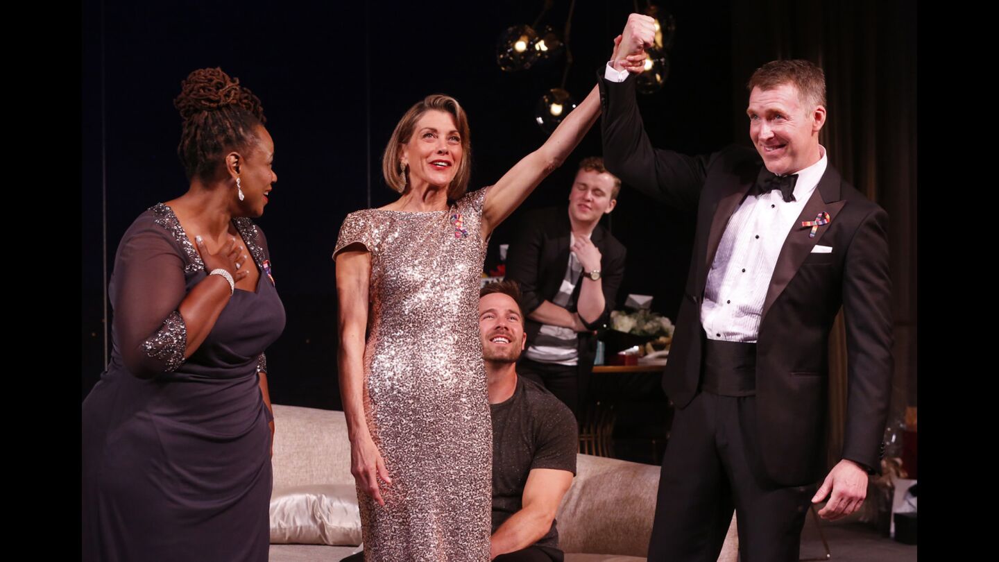 Kecia Lewis, from left, Wendie Malick, Luke Macfarlane, seated, Tom Phelan and Brian Hutchison in "Big Night," which is at the Kirk Douglas Theatre through Oct. 8.