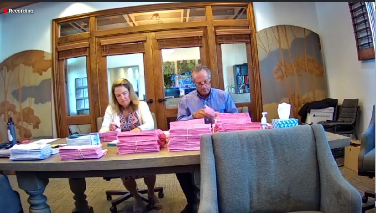 Election inspectors count ballots in the Rancho Santa Fe Association offices.