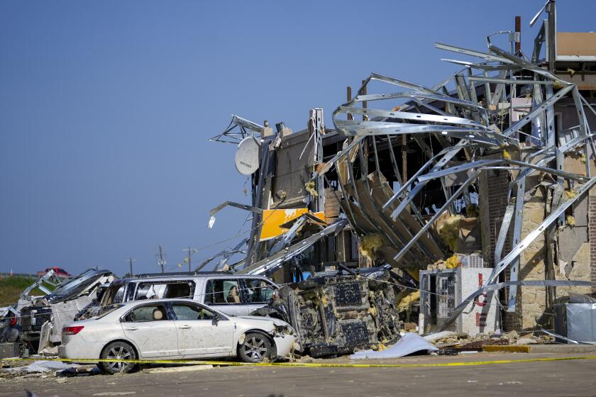 Damage is seen at a truck stop the morning after a tornado rolled through, Sunday, May 26, 2024, in Valley View, Texas. Powerful storms left a wide trail of destruction Sunday across Texas, Oklahoma and Arkansas after obliterating homes and destroying a truck stop where drivers took shelter during the latest deadly weather to strike the central U.S. (AP Photo/Julio Cortez)