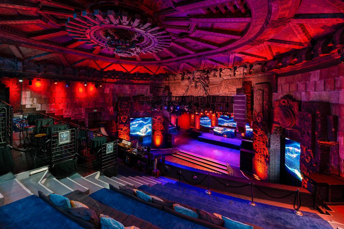 The Mayan Theater has an elaborate ceiling, here lighted red.