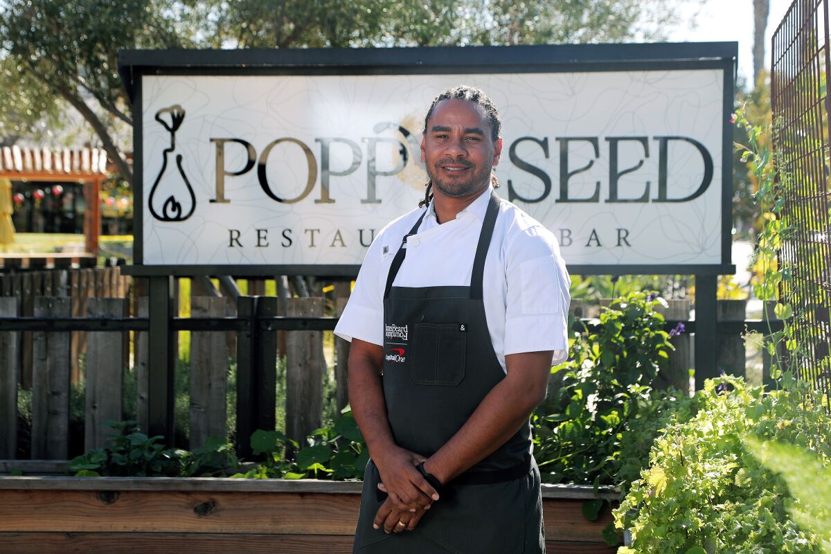 Chef Michael Reed in his garden at Poppy & Seed in Anaheim. 