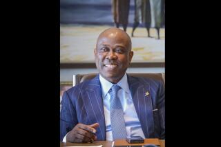 This undated photograph shows Herbert Wigwe, chief executive of Access Bank, Nigeria in his Lagos office. Wigwe was killed Friday, Feb. 9, 2024 along with his wife and son when a helicopter they were riding in crashed near in Southern California's Mojave Desert. (AP Photo/Ayodeji Owolabi)