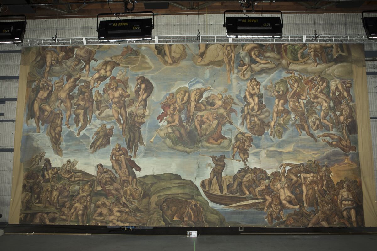A backing painted for the movie "The Shoes of the Fisherman" (1968) replicates Michelangelo's Italian fresco of "The Last Judgment" on the altar of the Sistine Chapel. The backing was rescued as part of the Artist Directors Guild Backdrop Recovery Project and donated to the University of Texas at Austin.