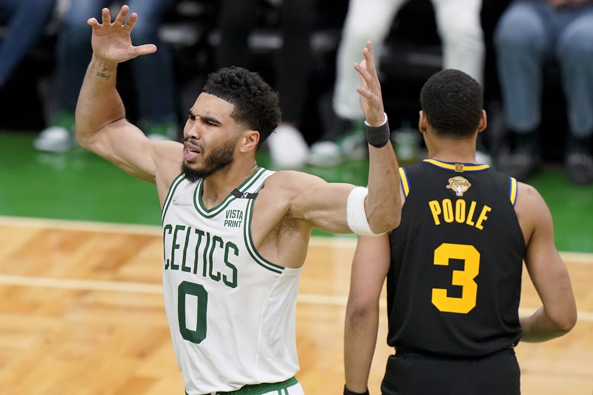 Celtics star Jayson Tatum shows his displeasure on the court during Game 4 against the Warriors.