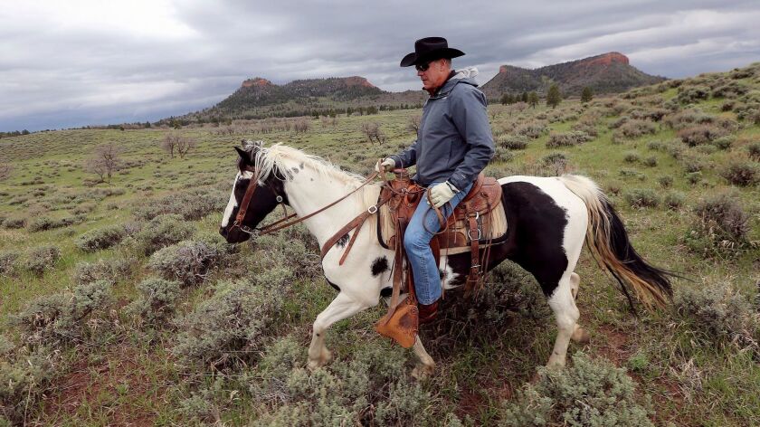 Interior Secretary Ryan Zinke enjoys a horseback ride in the Bears Ears National Monument with local and state representatives in Blanding, Utah.
