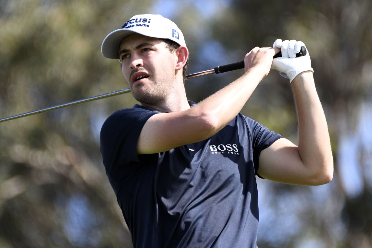 Patrick Cantlay hits from the first tee during the second round of the Tournament of Champions golf event, Friday, Jan. 8, 2021, at Kapalua Plantation Course in Kapalua, Hawaii. (Matthew Thayer/The Maui News via AP)