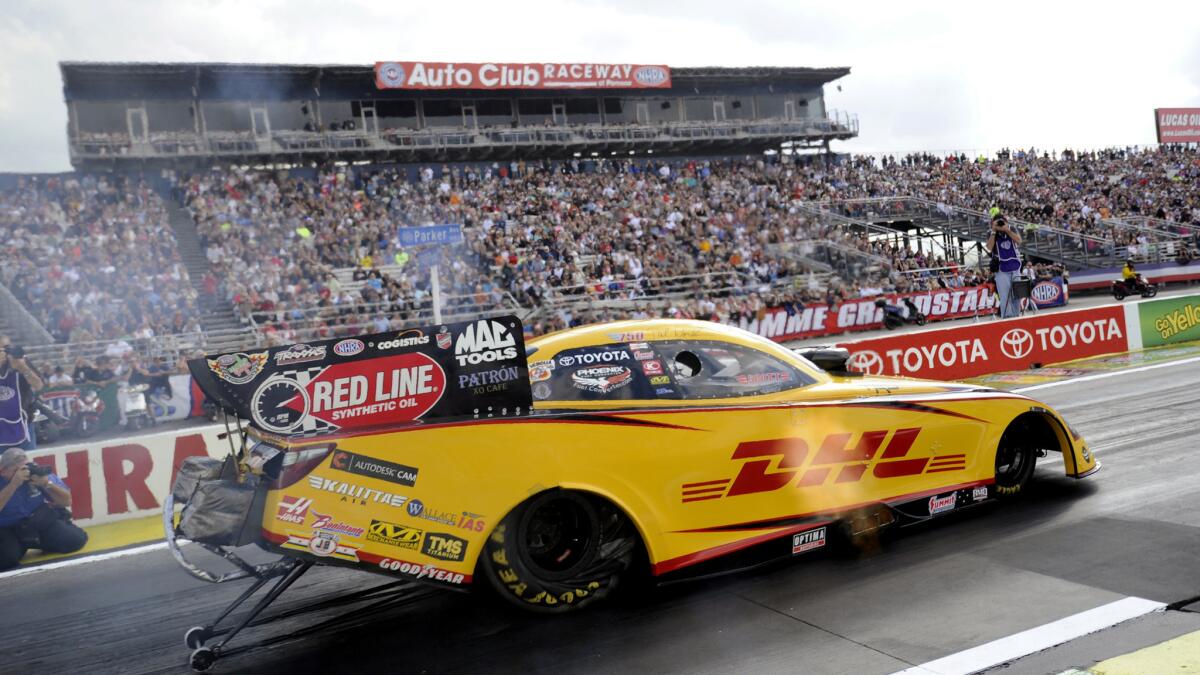 Funny car driver Del Worsham prepares to race at Auto Club Raceway in Pomona last November.