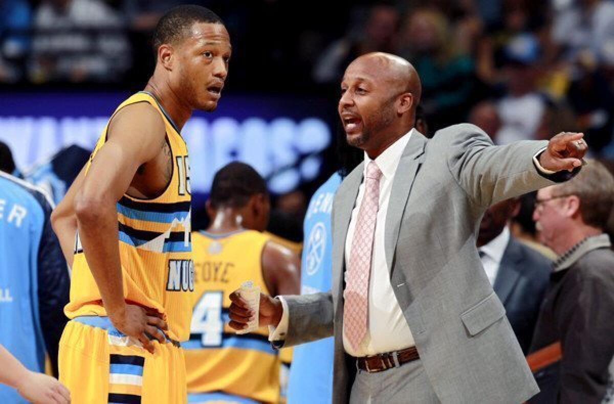 Nuggets Coach Brian Shaw gives instructions to forward Anthony Randolph in a recent game against Portland.