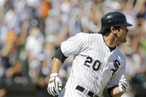 Thome HR lifts White Sox in opener