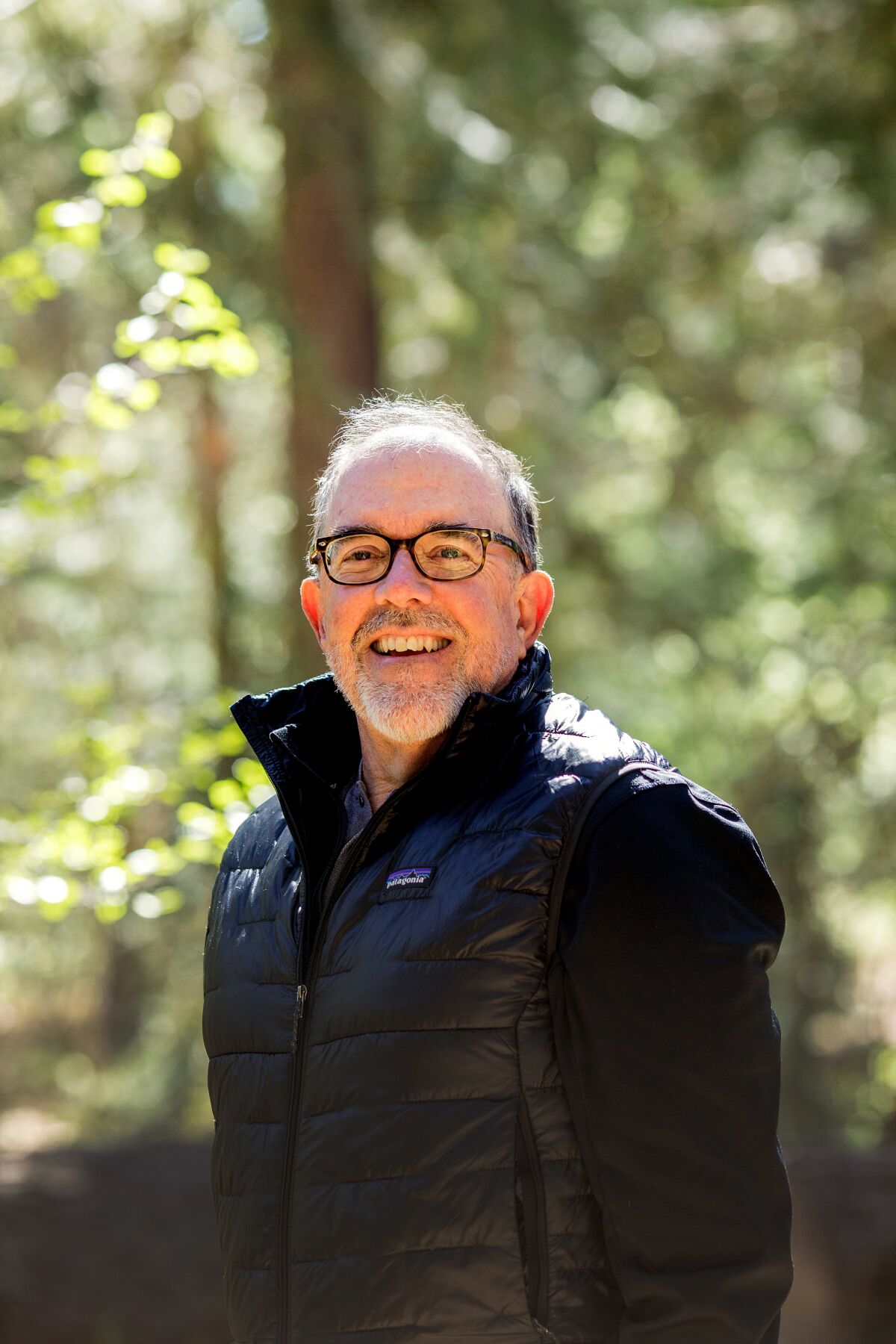 Author John Farrell in a padded jacket in nature