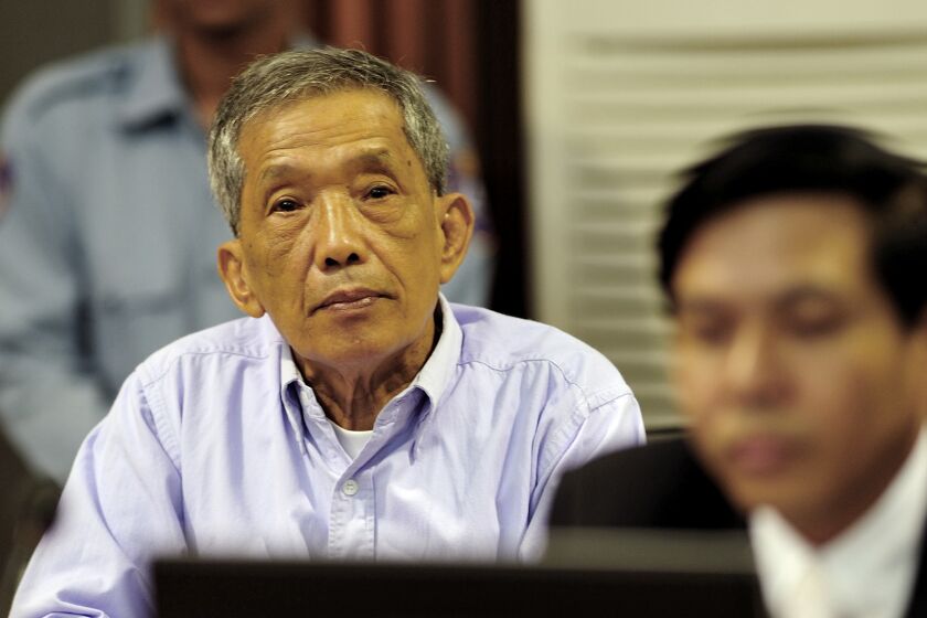 Kaing Guek Eav, also known as Duch, sits in court July 26, 2010, in Phnom Penh province.