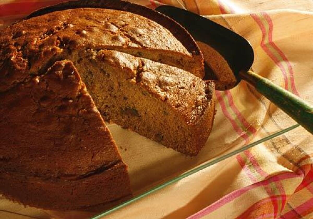 A dense beer cake is flavored with cinnamon, nutmeg and walnuts, and makes a lovely coffee cake alternative.