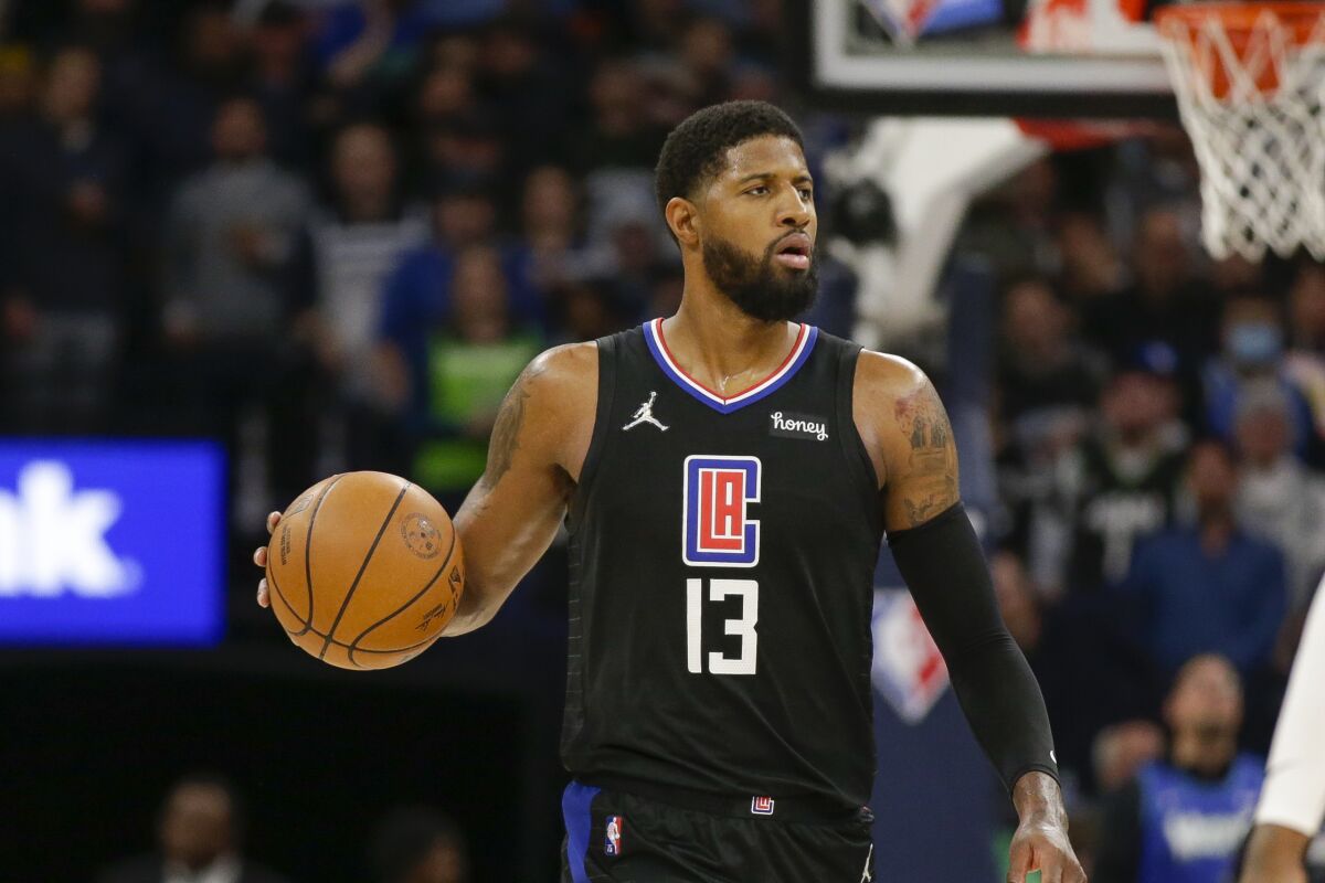 Los Angeles Clippers guard Paul George plays during an NBA basketball game against the Minnesota Timberwolves