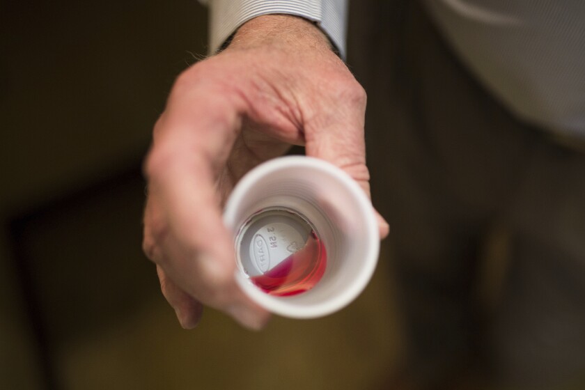 A 35-mg liquid dose of methadone is seen at a clinic in Rossville, Ga. 