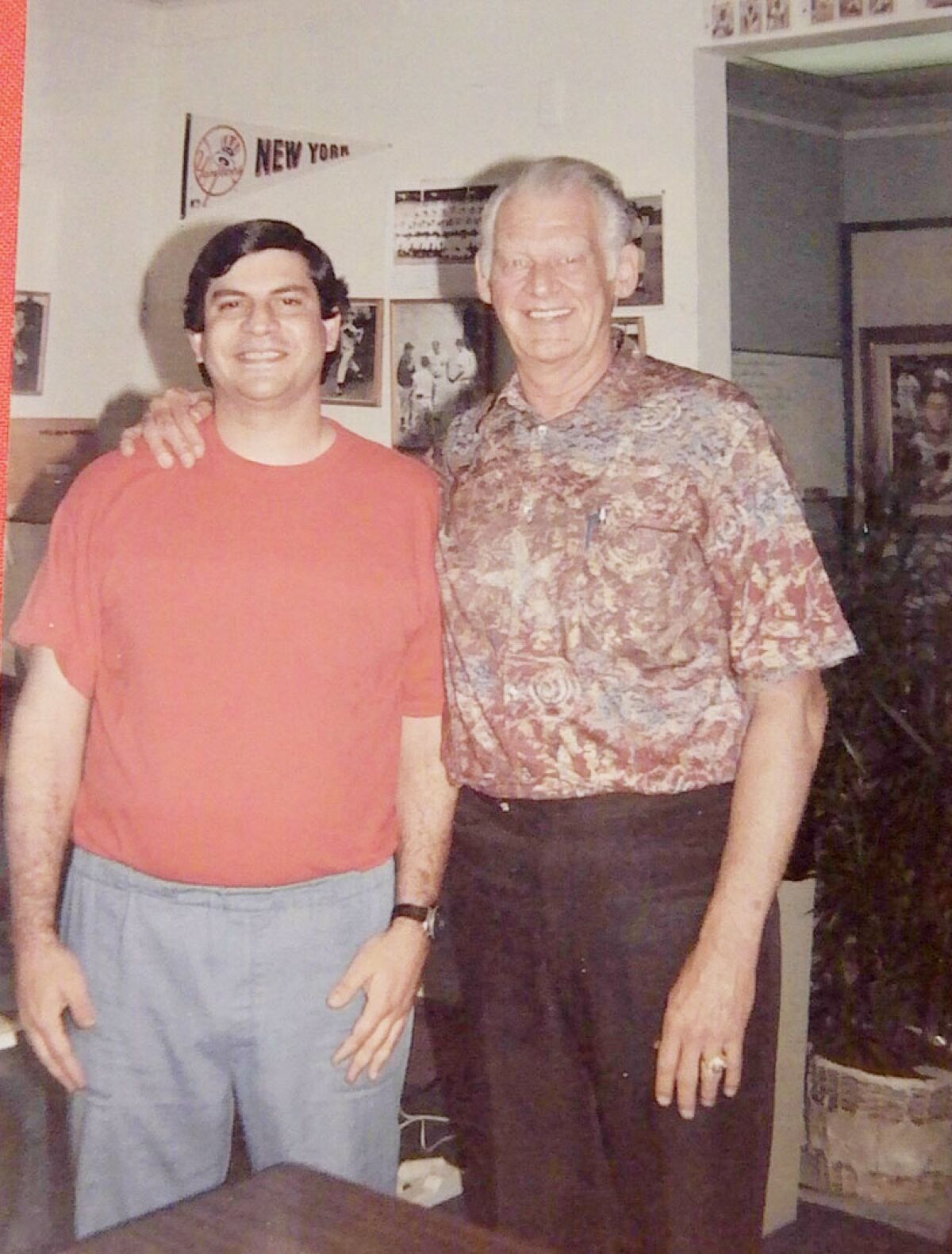 Fan Arthur Harutunian had his picture taken with Don Larsen when the perfect game pitcher made an appearance at a La Mesa baseball card shop in the 1990s.