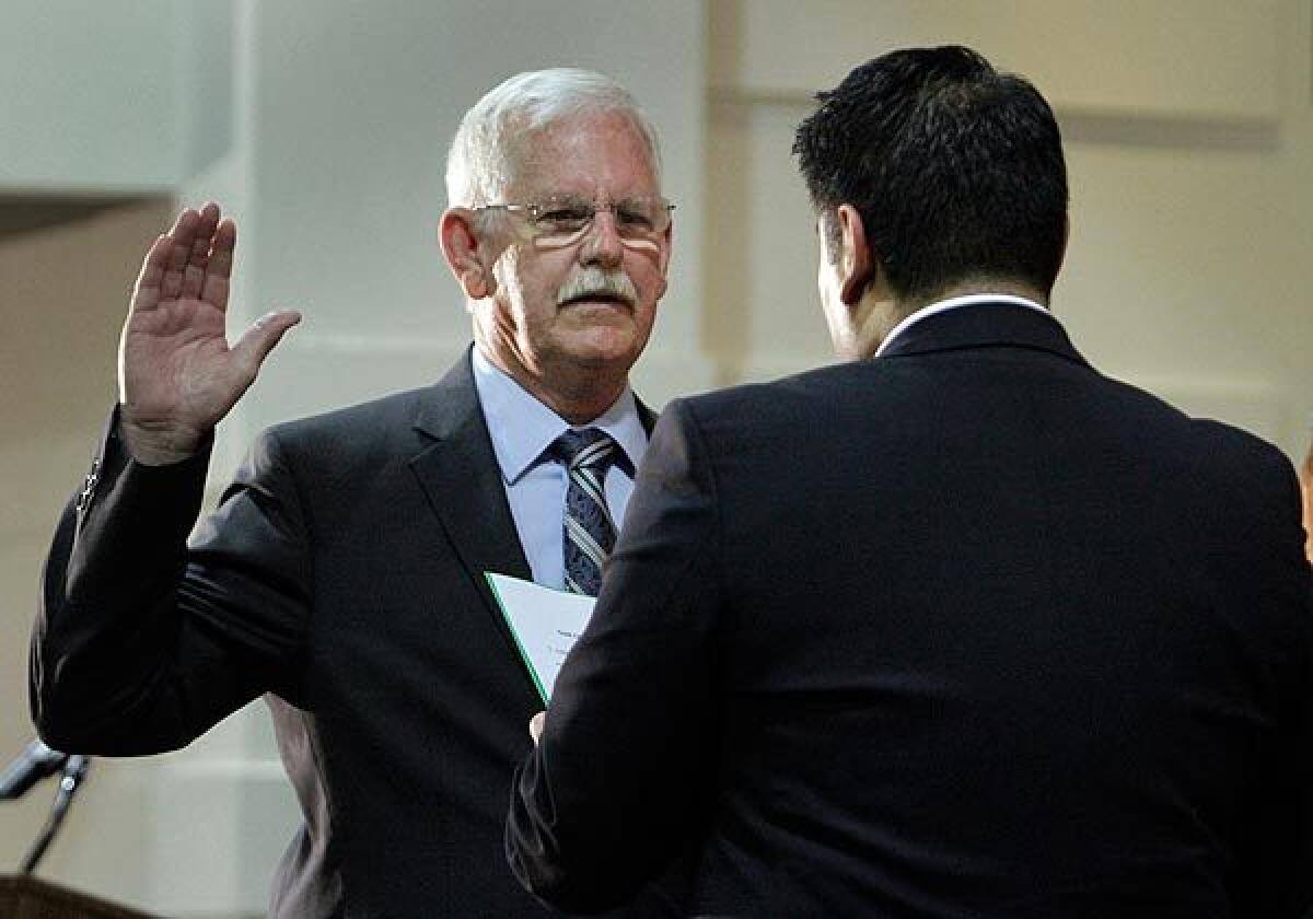 Danny Harber, seen being sworn in as a Bell City Council member, was arrested Tuesday on suspicion of killing his wife.