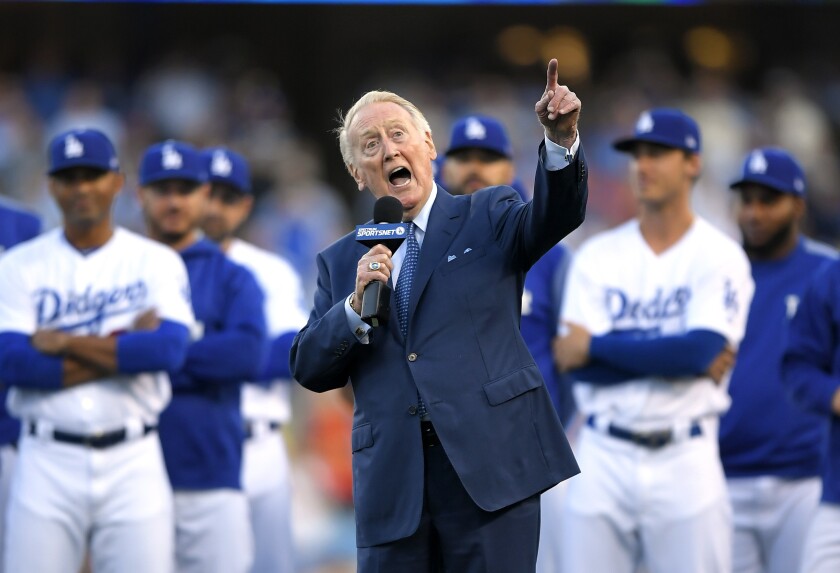 Dodgers broadcaster Vin Scully speaks during his induction into the team's Ring of Honor before a game May 3, 2017.