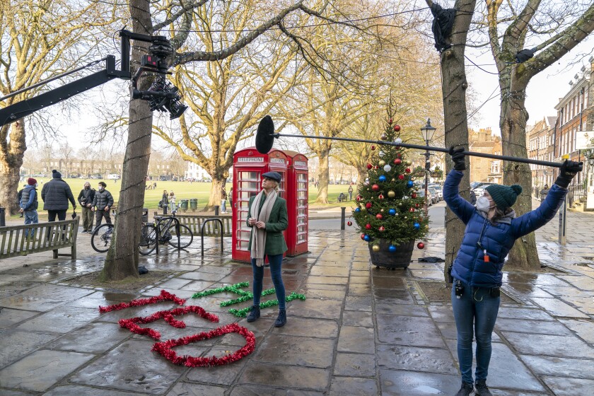 Filming takes place on the set of "Ted Lasso's" Christmas episode, featuring Hannah Waddingham.