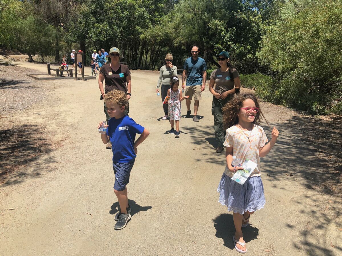 George and Frances Alesi leading the way on the trail walk through Fairbanks Ranch.