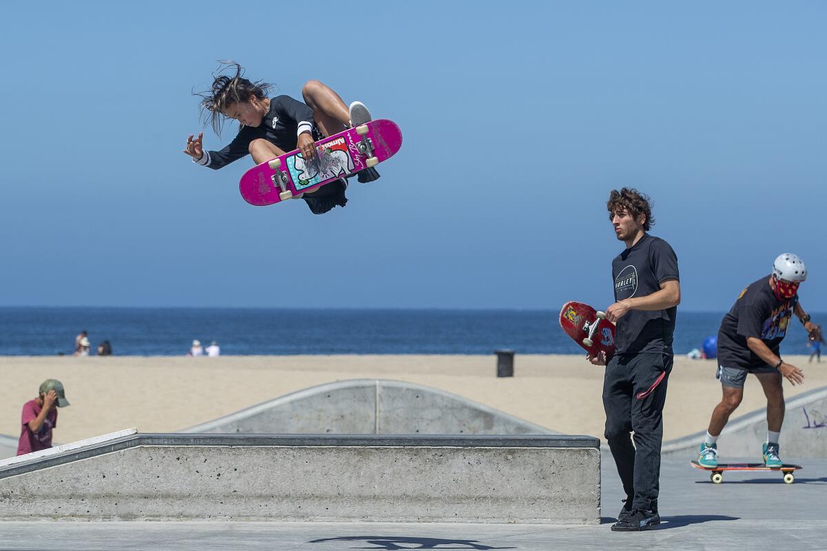 VENICE, CA -AUGUST 09, 2020: Sky Brown, 12, of Huntington Beach, gets airborne while skateboarding at the Venice Beach Skate Park. (Mel Melcon / Los Angeles Times)