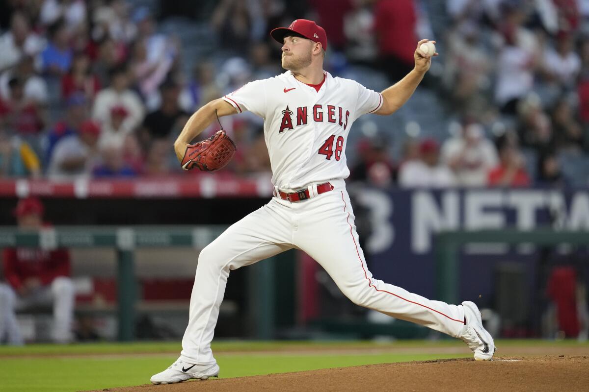 Angels pitcher Reid Detmers throws against the Texas Rangers.