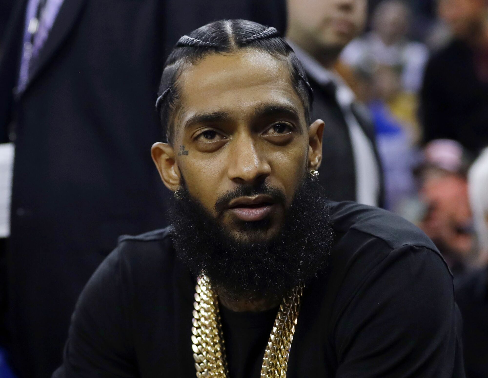 Nipsey Hussle at an NBA game in Oakland in 2018.