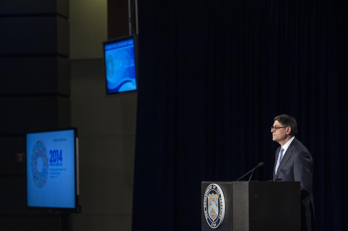 Treasury Secretary Jacob J. Lew answers questions from reporters Friday after meetings of International Monetary Fund, World Bank and international financial officials in Washington.