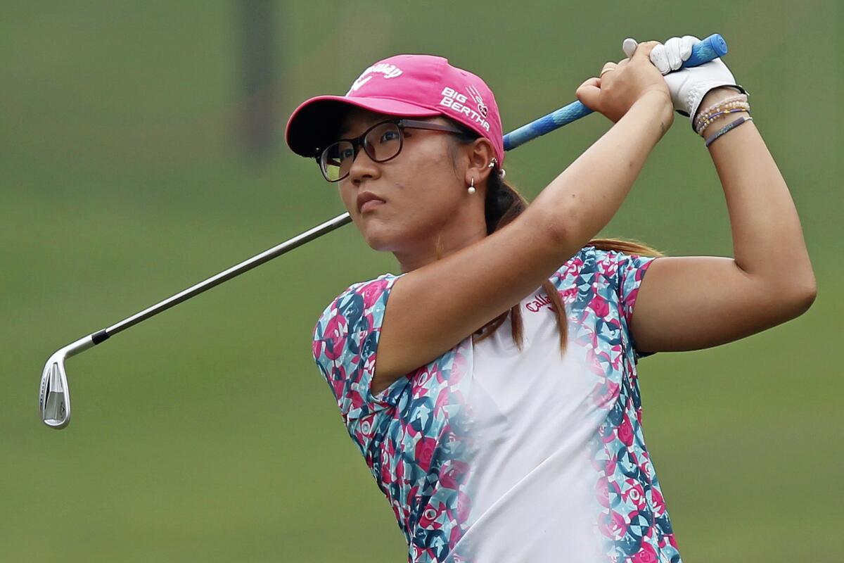Lydia Ko watches her shot on the 18th hole during the second round of the LPGA Malaysia tournament at Kuala Lumpur Golf and Country Club last month.
