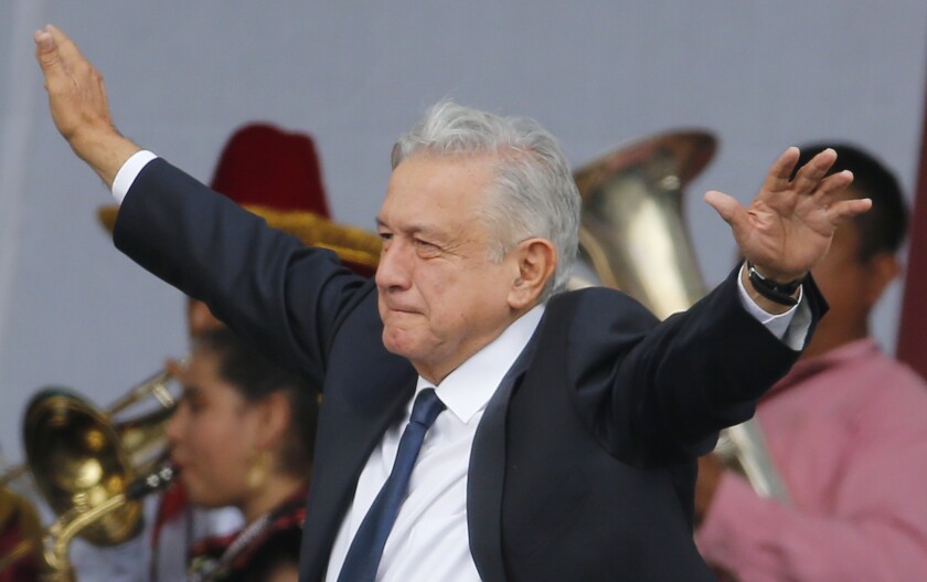 Mexico's President Andres Manuel Lopez Obrador arrives at a rally  July 1 to celebrate the anniversary of his election, in Mexico City's Zocalo square.