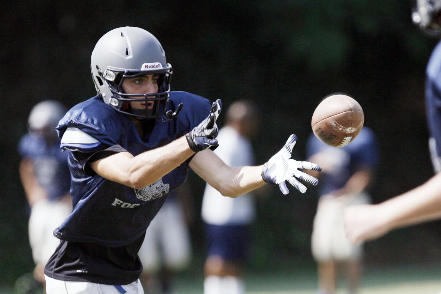 Flintridge Prep's Kareem Ismail catches the ball during practice at Flintridge Prep in La Canada on Friday, August 17, 2012.