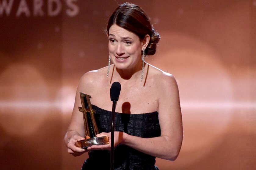 Gillian Flynn accepts the Hollywood screenwriter award for "Gone Girl" at the Hollywood Film Awards Friday evening.