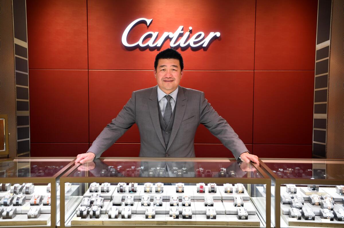 Timepiece and jewelry entrepreneur David Lee is seen at his store in Walnut. (Wally Skalij / Los Angeles Times)