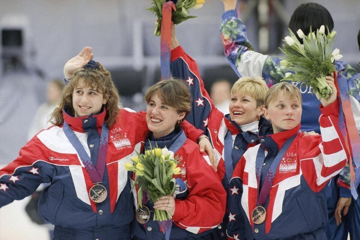 Nikki Meyer, left, formerly known as Nikki Ziegelmeyer, skated short track for the U.S. in the 1992 and '94 Olympics.