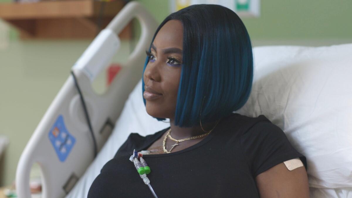 This July 2019 image provided by the Sarah Cannon Research Institute shows Victoria Gray on her infusion day during a gene editing trial for sickle cell disease at the Sarah Cannon Research Institute and The Children's Hospital At TriStar Centennial in Nashville. Since her treatment, Gray has weaned herself from pain medications she depended on to manage her symptoms. (Anthem Pictures/Sarah Cannon Research Institute via AP)