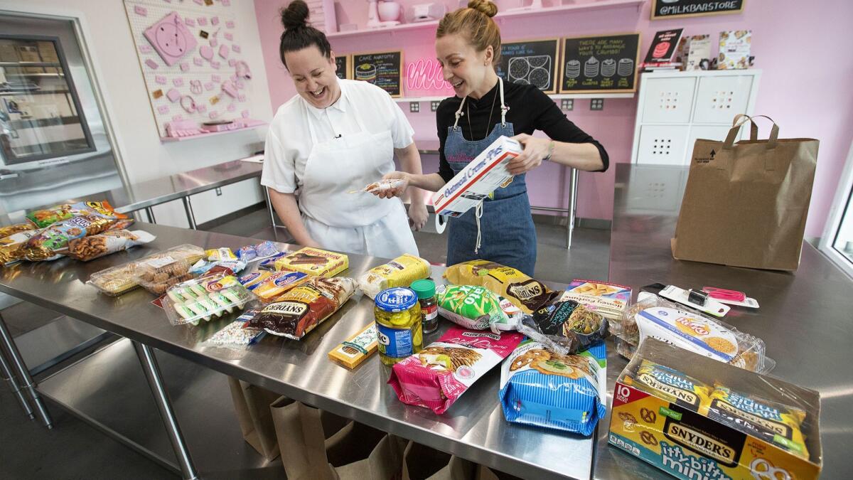 Anna McGorman, left, and Christina Tosi in the Milk Bar Lab in Los Angeles.