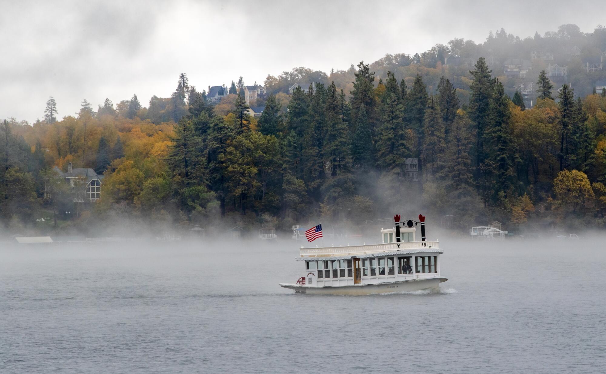 A cold front moves across Lake Arrowhead creating a fog for the Arrowhead Queen Tour Boat