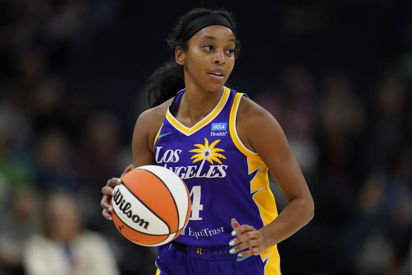 Los Angeles Sparks guard Lexie Brown dribbles down the court