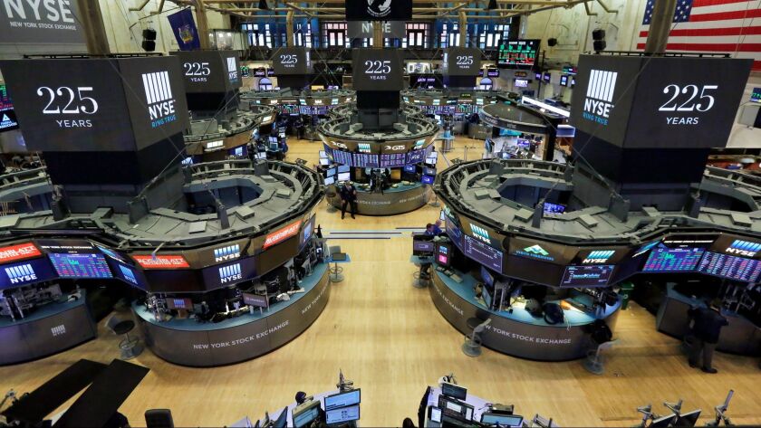 Traders work on the floor of the New York Stock Exchange in October.