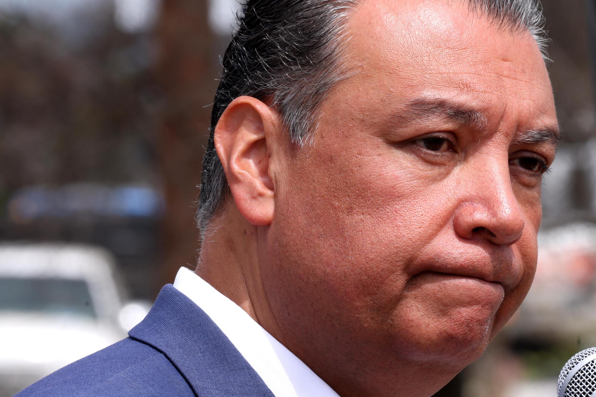 U.S. Sen. Alex Padilla speaks to the media.