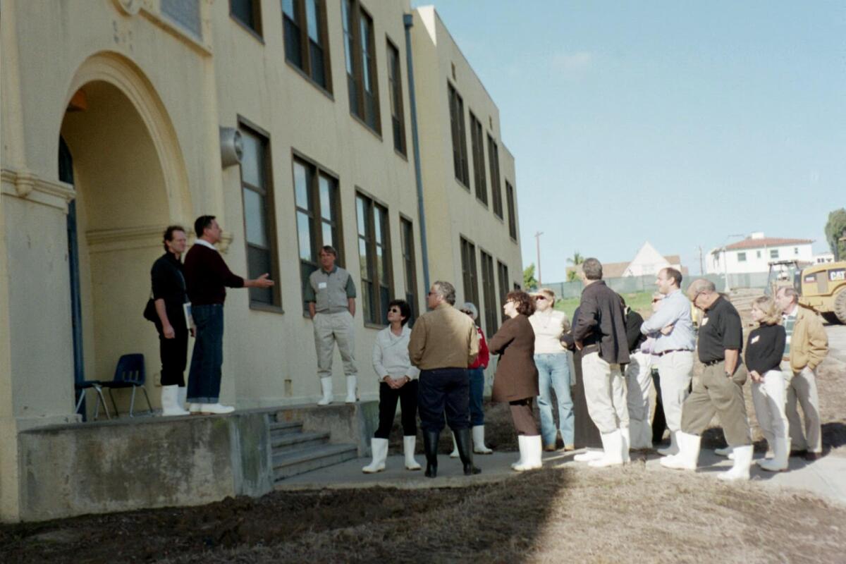 NTC Foundation Executive Director Alan Ziter leads a tour of the old Naval Training Center buildings in January 2005.