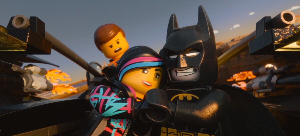 A scene from "The Lego Movie" featuring characters Batman, Wyldstyle and Emmet