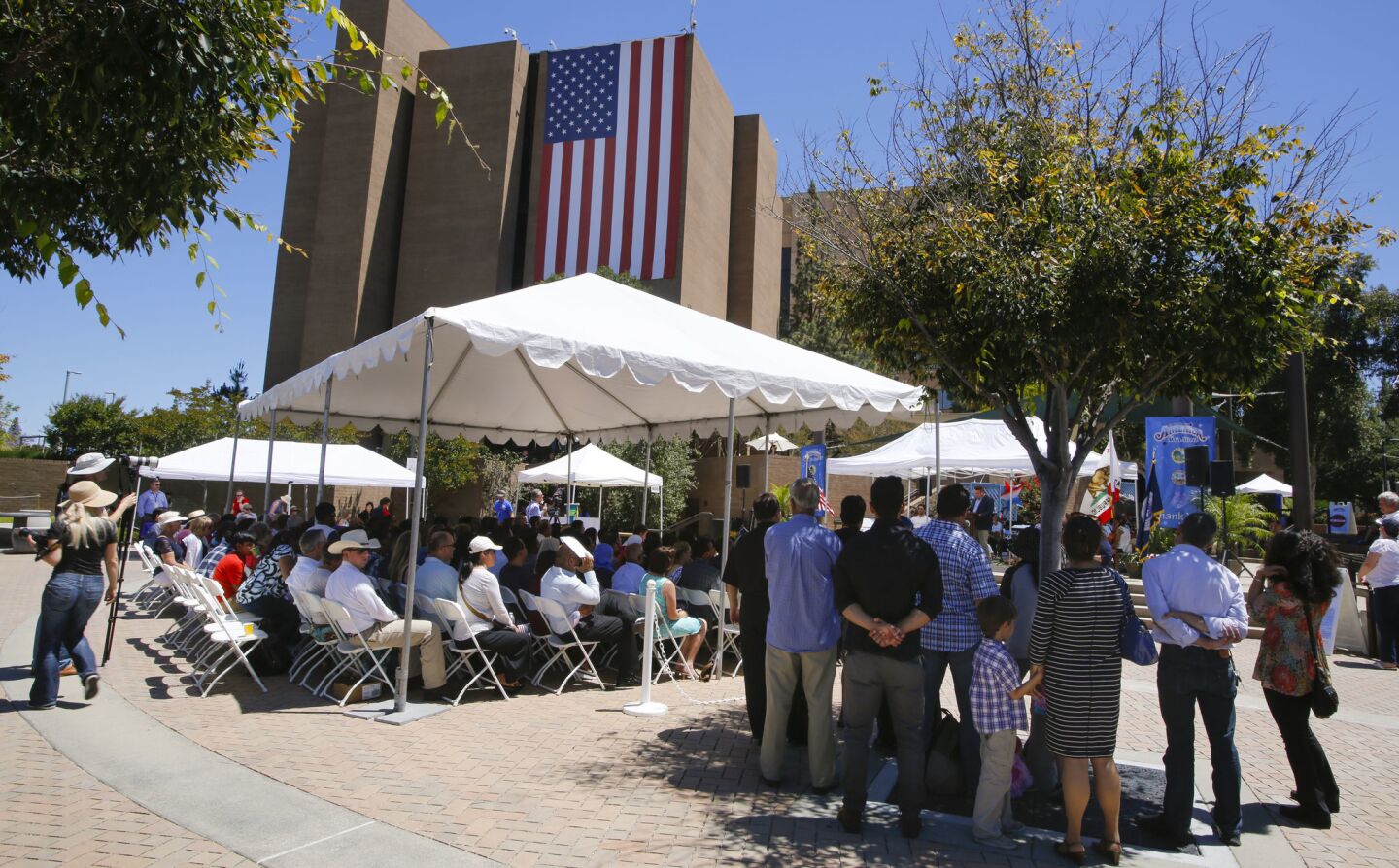 About 100 people from about 54 countries took the Oath of Allegiance to the United States of America and became U.S. citizens during a naturalization ceremony held in Centennial Plaza near El Cajon City Hall to kickoff El Cajon's, America on Main Street festivities.
