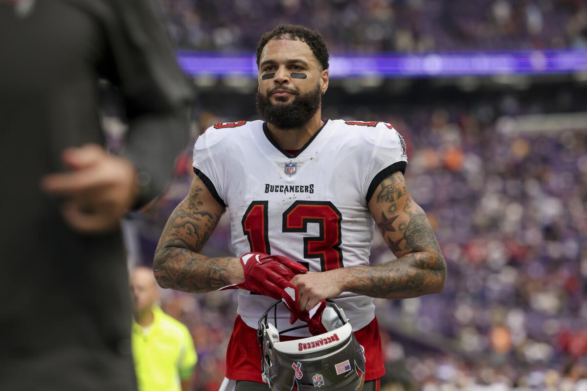 Buccaneers wide receiver Mike Evans (13) leaves the field during a game against the Minnesota Vikings.