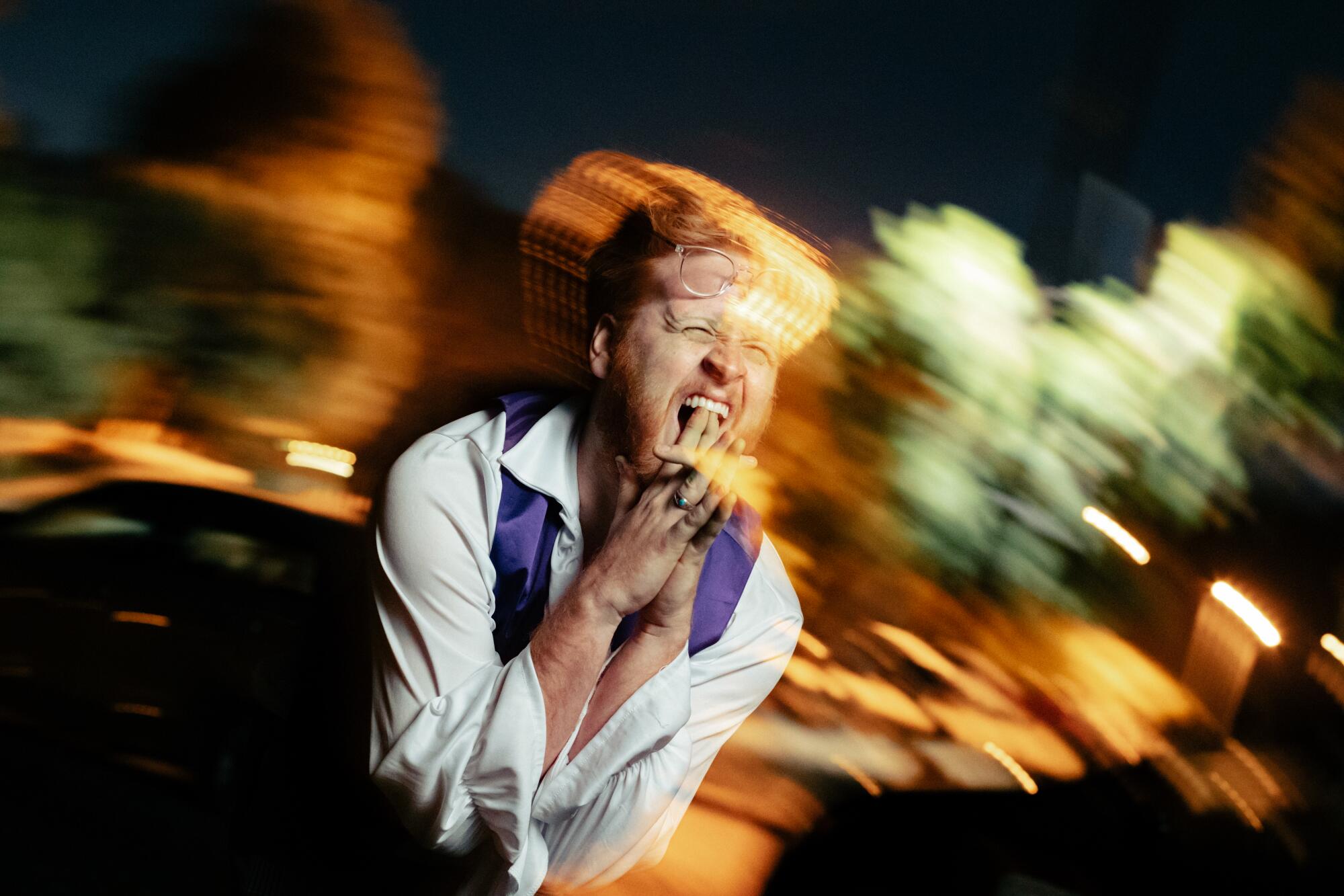 Blake Rosier performs during an evening of clowning.